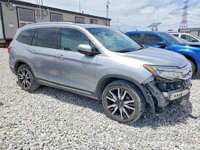 Czwarte zdjęcie samochodu z boku: 2019 HONDA PILOT TOURING VIN:5FNYF5H91KB033272 - miniatura