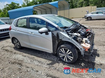 Czwarte zdjęcie samochodu z boku: 2016 HONDA FIT EX VIN:JHMGK5H76GX013942 - miniatura