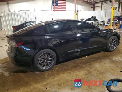 Trzecie zdjęcie samochodu z tyłu: 2022 TESLA MODEL 3 VIN:5YJ3E1EB8NF272108 - miniatura
