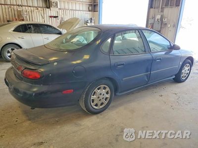 Trzecie zdjęcie samochodu z tyłu: 1998 FORD TAURUS LX VIN:1FAFP52S3WG255149 - miniatura