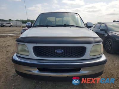 Piąte zdjęcie samochodu w środku: 1997 FORD F150 VIN:1FTDX1761VKB11066 - miniatura