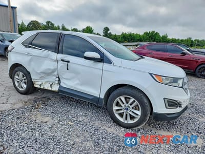 Czwarte zdjęcie samochodu z boku: 2018 FORD EDGE SEL VIN:2FMPK4J94JBB64201 - miniatura