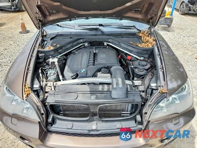 Zdjęcie 12 z 13 samochodu: 2013 BMW X5 XDRIVE35I VIN:5UXZV4C57D0E04475 - miniatura