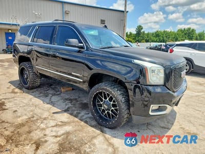 Czwarte zdjęcie samochodu z boku: 2015 GMC YUKON DENALI VIN:1GKS2CKJ6FR660062 - miniatura
