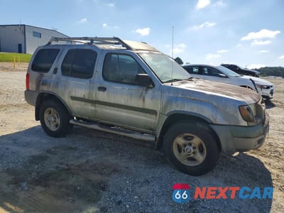 Czwarte zdjęcie samochodu z boku: 2001 NISSAN XTERRA XE-V6 VIN:5N1ED28T71C553700 - miniatura