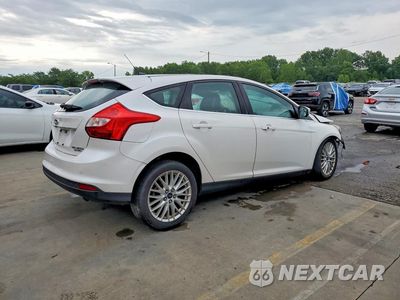 Trzecie zdjęcie samochodu z tyłu: 2014 FORD FOCUS TITANIUM VIN:1FADP3N25EL183156 - miniatura
