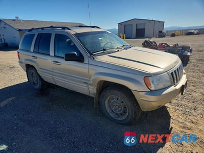 Czwarte zdjęcie samochodu z boku: 2001 JEEP GRAND CHEROKEE LIMITED VIN:1J4GW58N01C627348 - miniatura