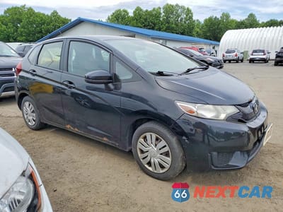 Czwarte zdjęcie samochodu z boku: 2016 HONDA FIT LX VIN:JHMGK5H56GX027967 - miniatura