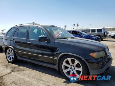 Czwarte zdjęcie samochodu z boku: 2004 BMW X5 4.8IS VIN:5UXFA93574LE81521 - miniatura