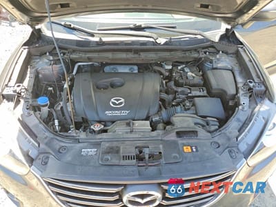 Zdjęcie 12 z 13 samochodu: 2016 MAZDA CX-5 GT VIN:JM3KE4DY6G0900033 - miniatura