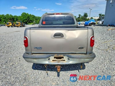 Zdjęcie 6 z 13 samochodu: 2002 FORD F150 SUPERCREW VIN:1FTRW07682KE38675 - miniatura