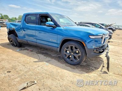 Czwarte zdjęcie samochodu z boku: 2025 RIVIAN R1T ADVENTURE VIN:7FCTGBAAXSN038315 - miniatura