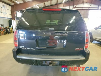 Zdjęcie 6 z 13 samochodu: 2011 GMC YUKON XL DENALI VIN:1GKS2MEF6BR274166 - miniatura