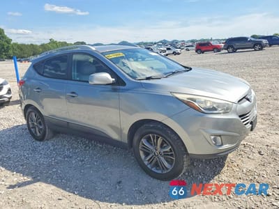 Czwarte zdjęcie samochodu z boku: 2015 HYUNDAI TUCSON SE VIN:KM8JU3AG9FU108507 - miniatura