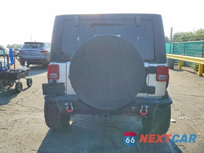 Zdjęcie 6 z 12 samochodu: 2011 JEEP WRANGLER SPORT VIN:1J4AA2D1XBL548163 - miniatura