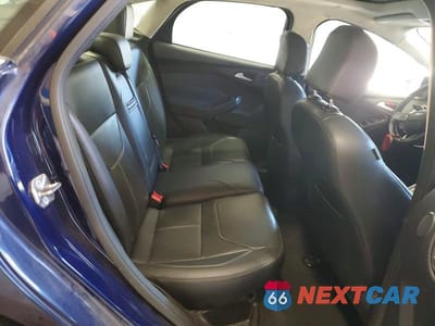 Zdjęcie 10 z 12 samochodu: 2016 FORD FOCUS TITANIUM VIN:1FADP3J26GL335759 - miniatura