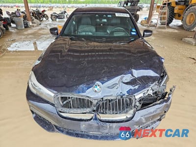Piąte zdjęcie samochodu w środku: 2019 BMW 740 I VIN:WBA7E2C55KB217261 - miniatura