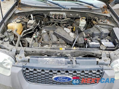 Zdjęcie 12 z 13 samochodu: 2006 FORD ESCAPE XLT VIN:1FMYU93196KC72538 - miniatura