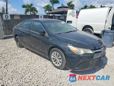 Czwarte zdjęcie samochodu z boku: 2015 TOYOTA CAMRY HYBRID LE VIN:4T1BD1FK0FU150036 - miniatura