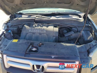 Zdjęcie 12 z 13 samochodu: 2006 HONDA PILOT EX VIN:5FNYF28486B038915 - miniatura