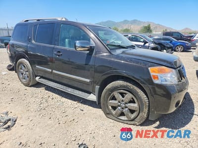 Czwarte zdjęcie samochodu z boku: 2014 NISSAN ARMADA PLATINUM VIN:5N1BA0NE9EN600810 - miniatura