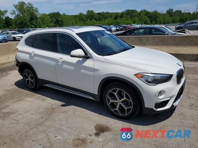Czwarte zdjęcie samochodu z boku: 2019 BMW X1 XDRIVE28I VIN:WBXHT3C59K3H34405 - miniatura