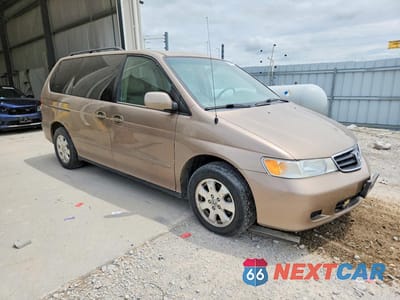 Czwarte zdjęcie samochodu z boku: 2004 HONDA ODYSSEY EX VIN:5FNRL18844B113214 - miniatura