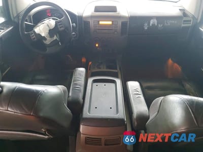 Zdjęcie 8 z 12 samochodu: 2004 NISSAN TITAN XE VIN:1N6AA07B24N553747 - miniatura