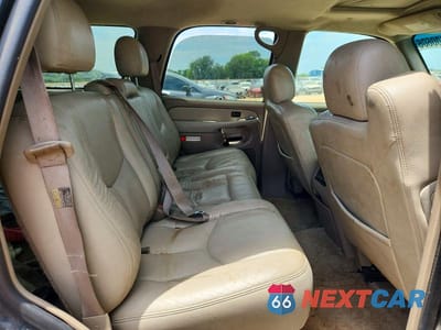 Zdjęcie 11 z 13 samochodu: 2003 GMC YUKON VIN:1GKEK13Z93J118633 - miniatura