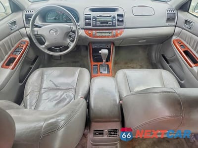 Zdjęcie 8 z 12 samochodu: 2003 TOYOTA CAMRY XLE VIN:4T1BE30K13U665365 - miniatura