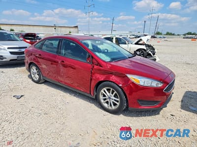 Czwarte zdjęcie samochodu z boku: 2016 FORD FOCUS SE VIN:1FADP3F25GL220627 - miniatura