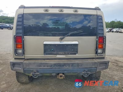 Zdjęcie 6 z 12 samochodu: 2003 HUMMER H2 VIN:5GRGN23UX3H145531 - miniatura
