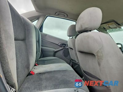 Zdjęcie 10 z 13 samochodu: 2002 FORD FOCUS ZTS VIN:1FAFP38382W342999 - miniatura