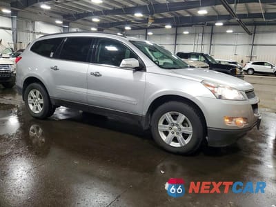 Czwarte zdjęcie samochodu z boku: 2011 CHEVROLET TRAVERSE LT VIN:1GNKRJED5BJ279031 - miniatura