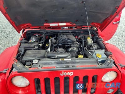Zdjęcie 11 z 12 samochodu: 2015 JEEP WRANGLER UNLIMITED SAHARA VIN:1C4BJWEGXFL527971 - miniatura