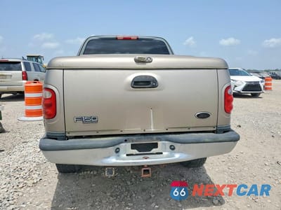 Zdjęcie 6 z 12 samochodu: 2003 FORD F-150 VIN:1FTRW08L73KD56670 - miniatura
