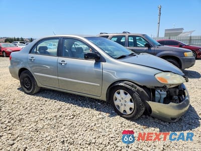 Czwarte zdjęcie samochodu z boku: 2003 TOYOTA COROLLA LE VIN:1NXBR32E93Z035332 - miniatura
