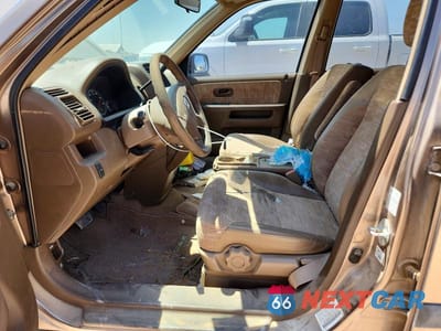 Zdjęcie 7 z 12 samochodu: 2003 HONDA CR-V LX VIN:JHLRD68473C005479 - miniatura