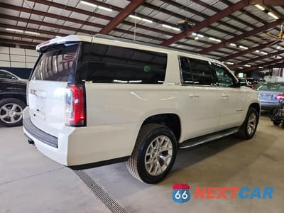 Trzecie zdjęcie samochodu z tyłu: 2015 GMC YUKON XL K1500 SLT VIN:1GKS2HKC4FR531199 - miniatura