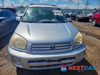Piąte zdjęcie samochodu w środku: 2001 TOYOTA RAV4 BASE VIN:JTEHH20V710102394 - miniatura