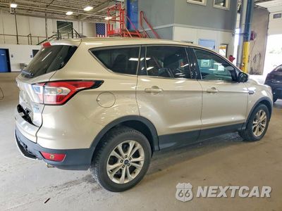 Trzecie zdjęcie samochodu z tyłu: 2017 FORD ESCAPE SE VIN:1FMCU9GD9HUE55539 - miniatura