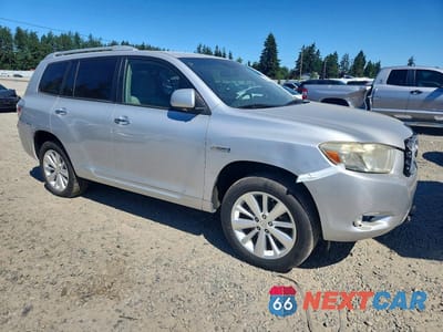 Czwarte zdjęcie samochodu z boku: 2010 TOYOTA HIGHLANDER HYBRID VIN:JTEBW3EH4A2043054 - miniatura