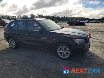Czwarte zdjęcie samochodu z boku: 2014 BMW X1 XDRIVE28I VIN:WBAVL1C51EVY10755 - miniatura