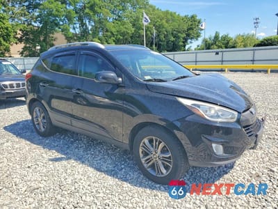 Czwarte zdjęcie samochodu z boku: 2015 HYUNDAI TUCSON SE VIN:KM8JUCAG7FU090413 - miniatura