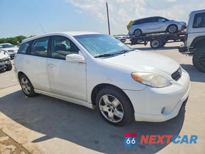 Czwarte zdjęcie samochodu z boku: 2007 TOYOTA COROLLA MATRIX XR VIN:2T1KR32E37C670005 - miniatura