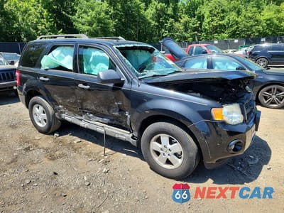 Czwarte zdjęcie samochodu z boku: 2011 FORD ESCAPE XLT VIN:1FMCU0DG0BKA66009 - miniatura