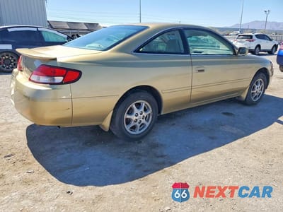 Trzecie zdjęcie samochodu z tyłu: 2000 TOYOTA CAMRY SOLARA SE VIN:2T1CG22P4YC406220 - miniatura
