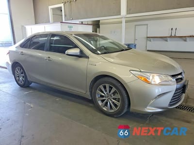 Czwarte zdjęcie samochodu z boku: 2015 TOYOTA CAMRY HYBRID XLE VIN:4T1BD1FK2FU142245 - miniatura