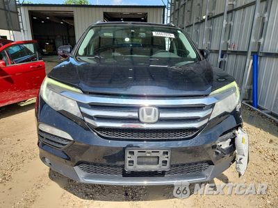 Piąte zdjęcie samochodu w środku: 2018 HONDA PILOT TOURING VIN:5FNYF6H98JB033838 - miniatura