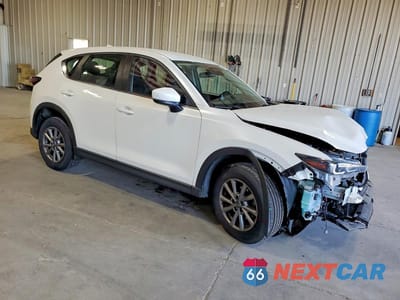 Czwarte zdjęcie samochodu z boku: 2022 MAZDA CX-5 VIN:JM3KFBAM9N0546833 - miniatura